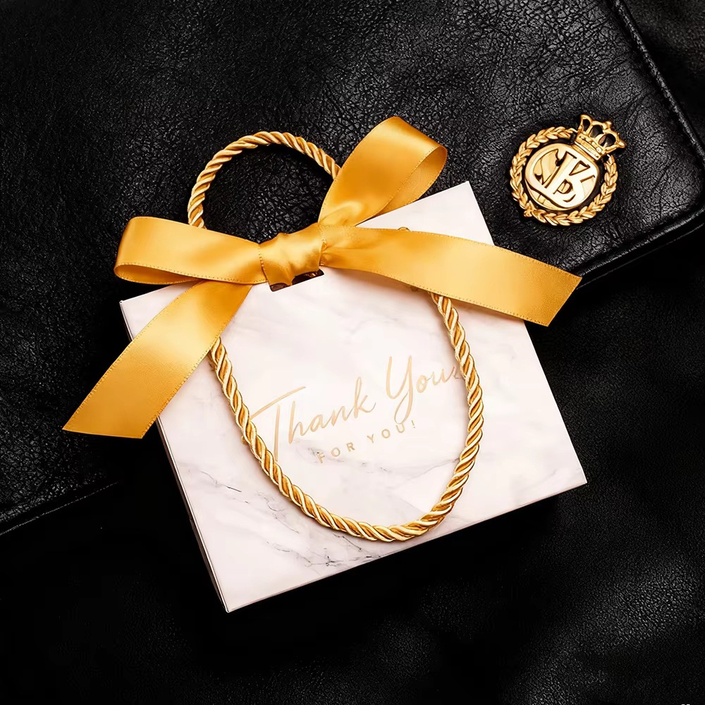 纸袋定制手提袋购物袋定 制豪华纸袋烫印粉色手袋再生棉时尚可持