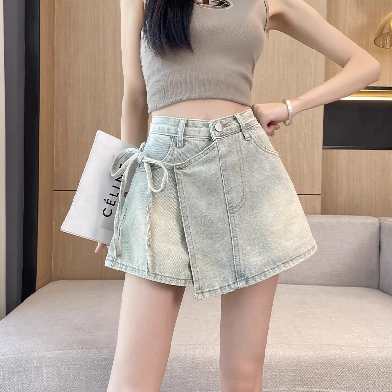 高腰牛仔短裙女夏季新款2026年新款显瘦阔腿辣妹瘦a字半身裙裤子