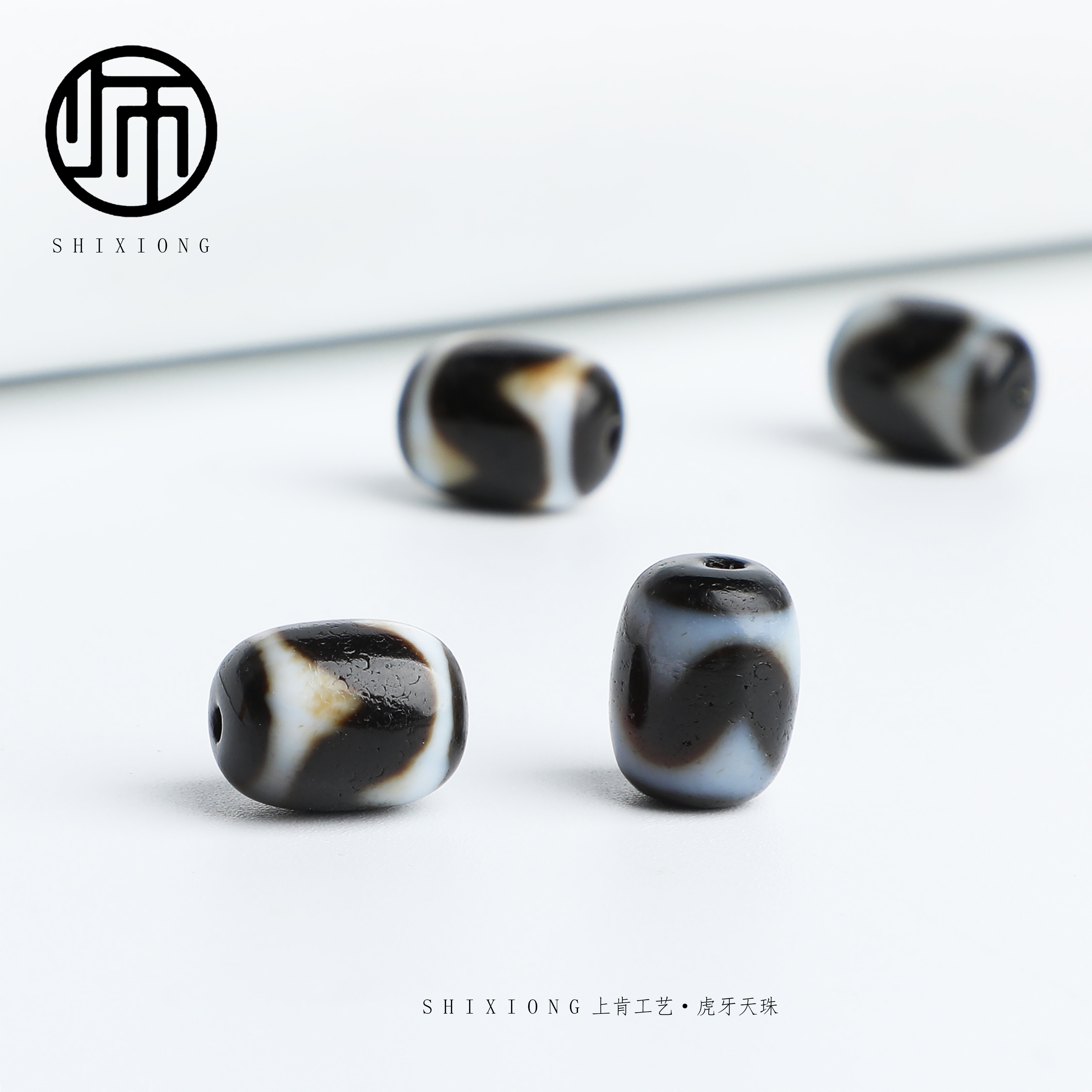 Tibet natural authentic tiger teeth diarrhea beads have a craft size of about 10*13 (diversity is randomly sent)