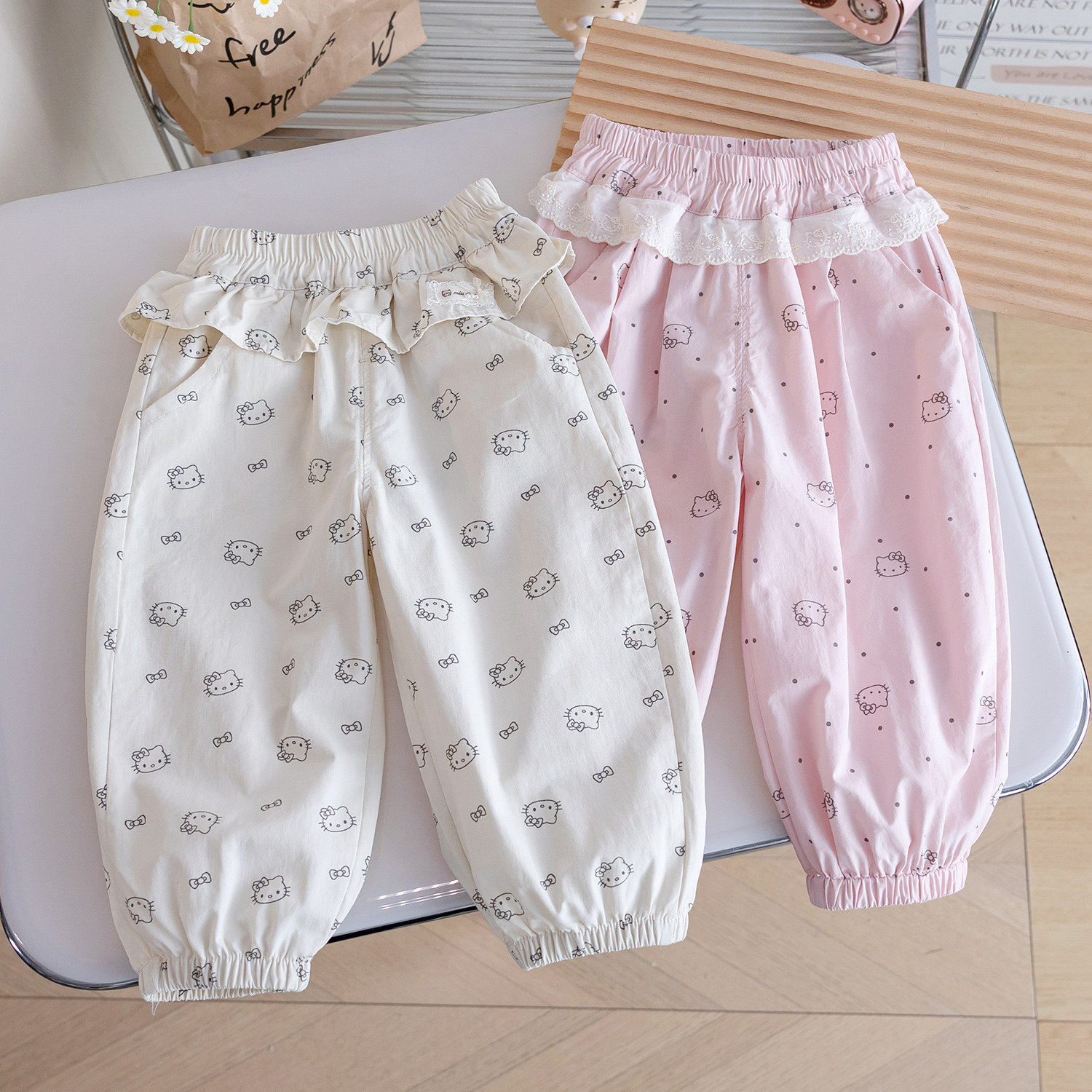 女童可爱风束脚裤2026春季新款卡通猫咪印花时尚花边洋气百搭裤子