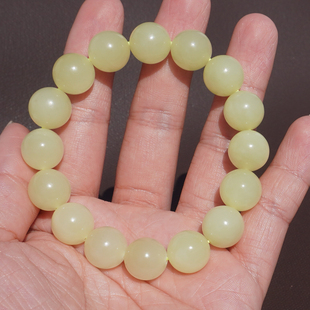 380元放漏仅一条方言和田玉新疆且末高脂糯黄口料12mm圆珠手串A6