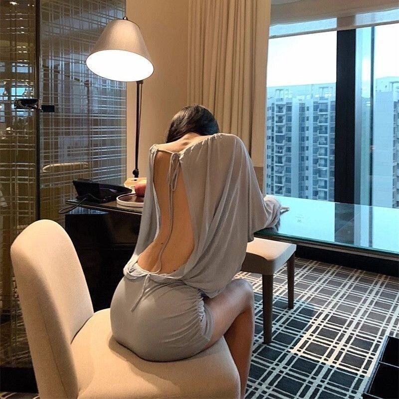 蓝色一字肩长袖连衣裙女秋季显瘦收腰裙子蝙蝠袖纯欲辣妹包臀短裙