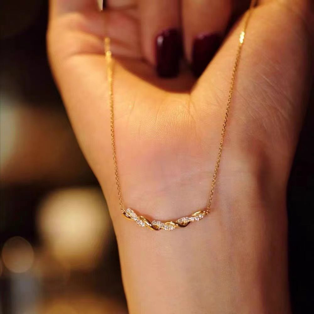 S925纯银新款麻花微笑项链女轻奢小众设计高级简约气质百搭锁骨链