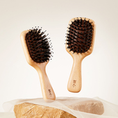 初心猪鬃毛气垫梳子顺发气囊按摩头皮女士专用长发家用木梳高颅顶