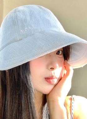 蓝色棉麻渔夫帽女夏季薄款透气大帽檐户外防晒遮阳显脸小太阳帽子