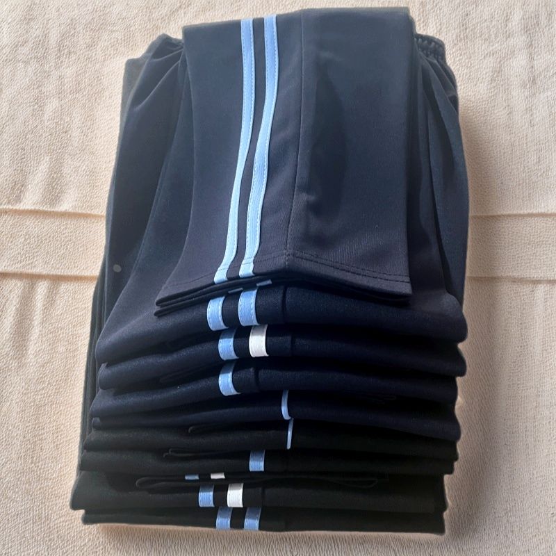 男女学生浅蓝一二三根条宽松校裤