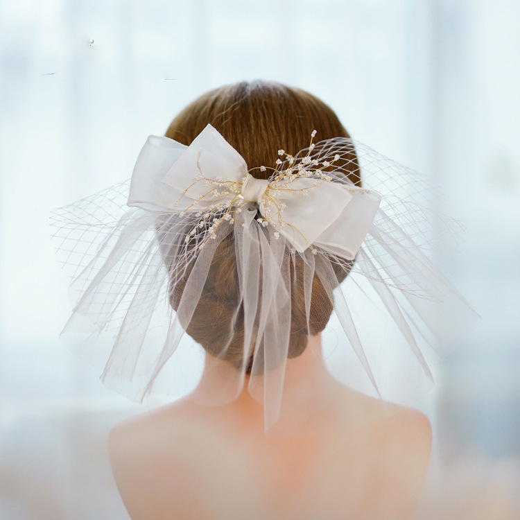 手工串珠白色蝴蝶结唯美短纱发夹婚纱礼服跟妆拍摄新娘头饰