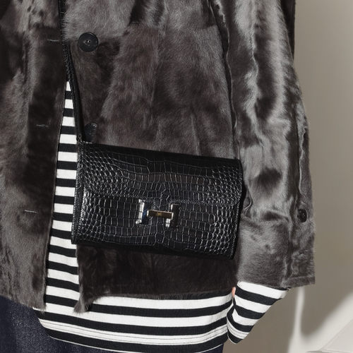 牛皮手拿单肩包斜挎包包女士