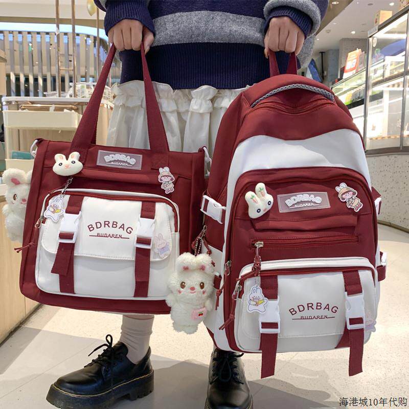 高档书包女生小学生三到五六年级女孩减负甜酷大容量初中防水双肩