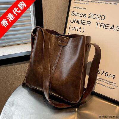 香港正品真皮高级感单肩斜挎包包女2025新款通勤大容量水桶包