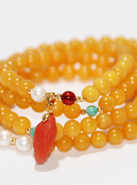 7mm鸡油黄蜜蜡多宝串