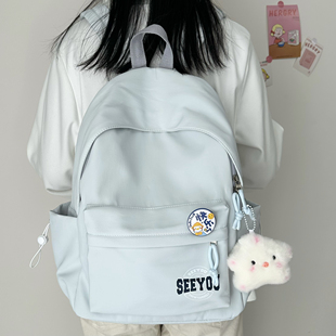 书包女生大学生日系纯色简约百搭初中高中生双肩包轻便旅游小背包