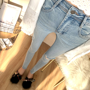 潮 女春夏高腰巨显瘦提臀小脚裤 超洋气 浅蓝色弹力紧身破洞牛仔裤