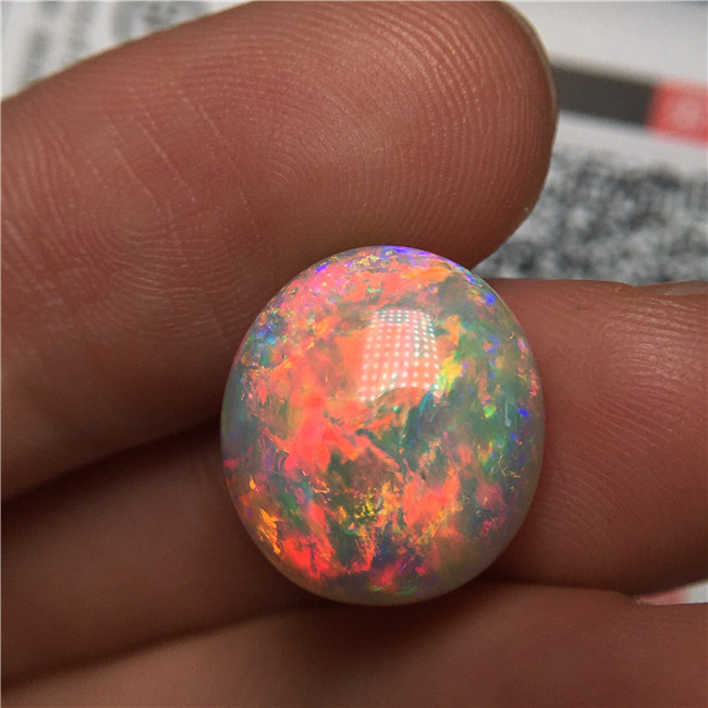 收藏级 艳红靓七彩澳洲闪电岭水晶黑欧泊 14*15.3*8MM 10.195克拉