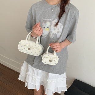 女童碎花高颜值洋气手提蝴蝶结爱心零钱包少女心精致保龄球小挎包