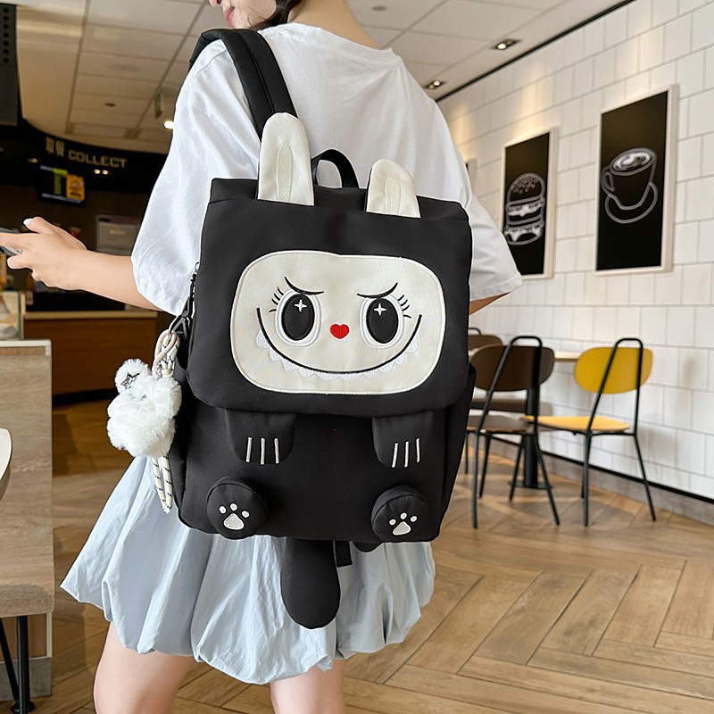 2025新款可爱卡通双肩背包中小学生个性书包女尼龙轻便大容量背包