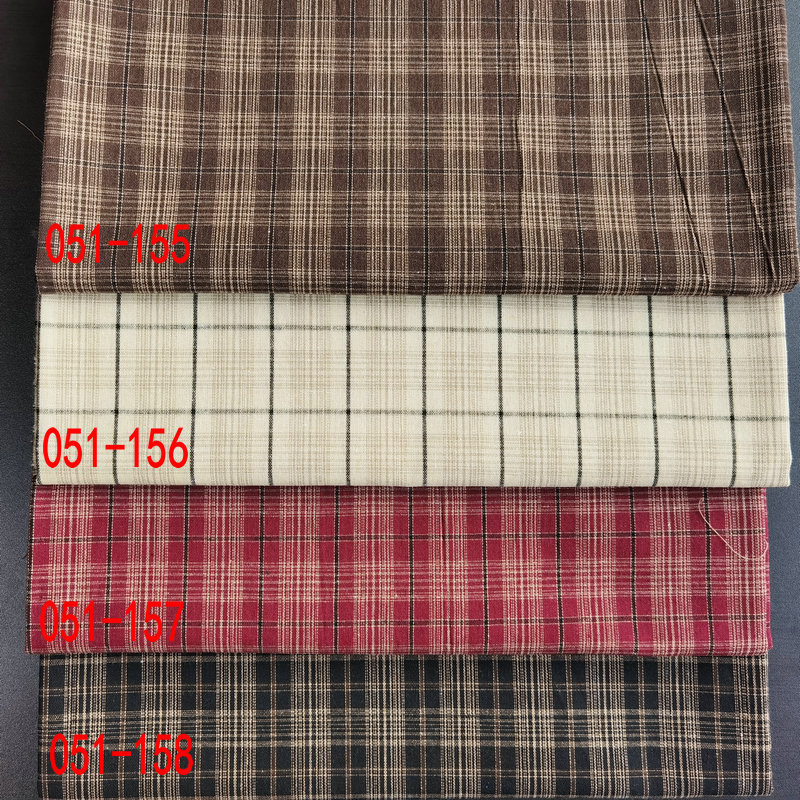 春夏款格子衬衫面料21支涤棉色织布 135平方克梭织提花服饰面料布