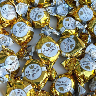 俄罗斯进口康吉KONTI巧克力炼乳味夹心糖果金色百合结婚高端喜糖