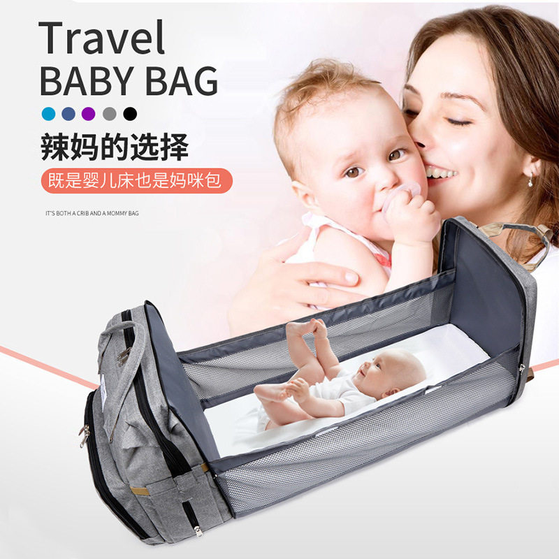妈咪包亚马逊新款外出便携折叠床母婴背包大容量多功能双肩妈咪包图片