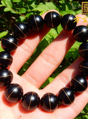 收藏新疆漆黑如墨一细墨玉籽料