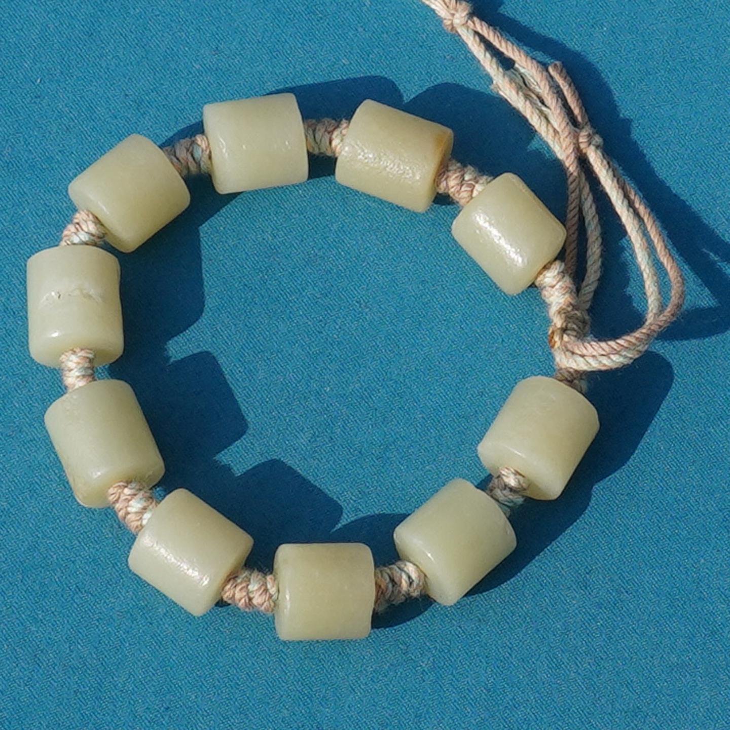 和田玉且末淡黄口料老光工艺手串