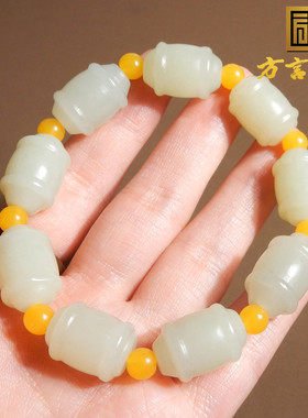 新疆无结构且末料带翠色玉鼓珠串
