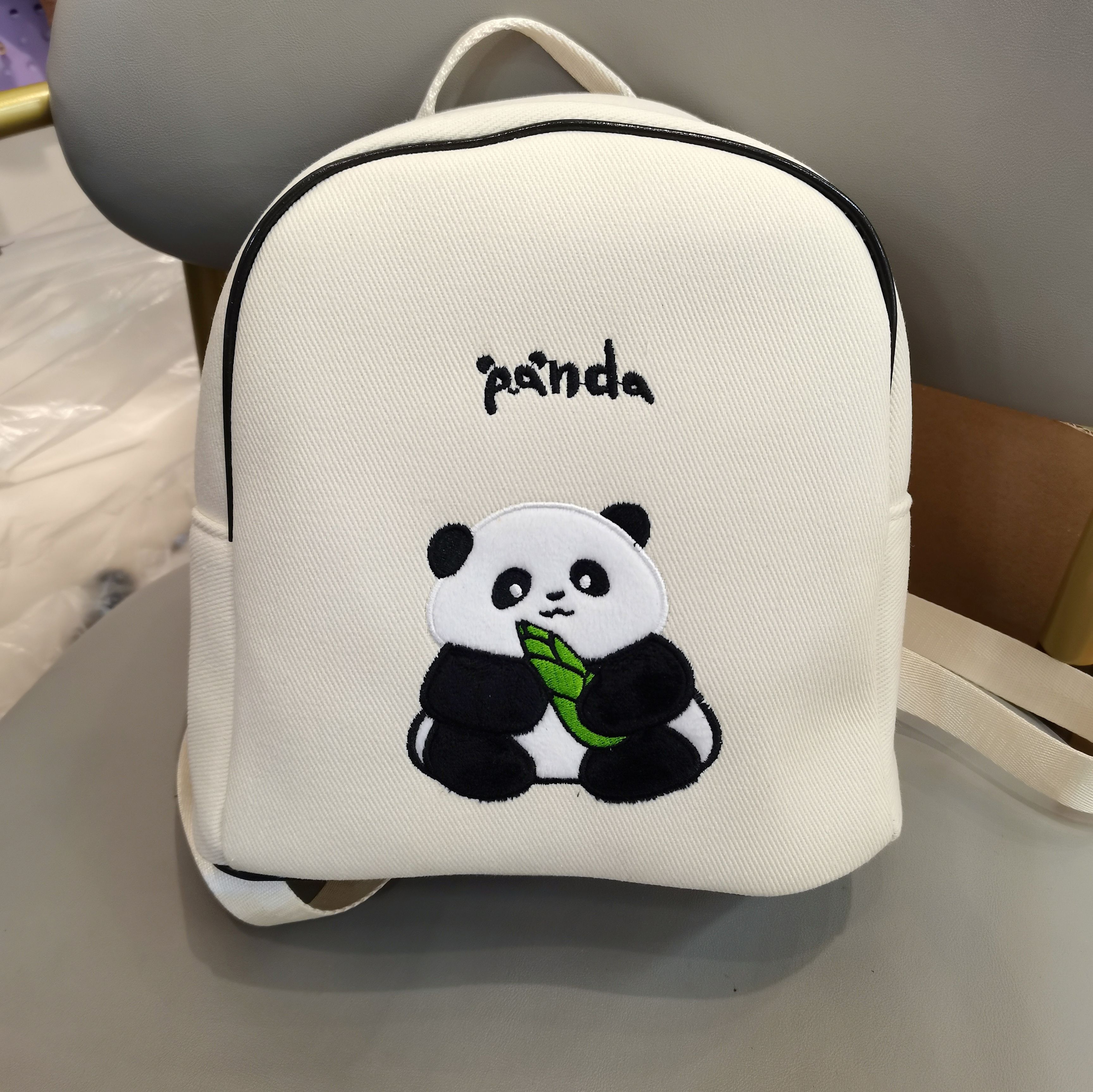 成都纪念品爆款大容量熊猫双肩帆布包刺绣工艺熊猫基地同款背包
