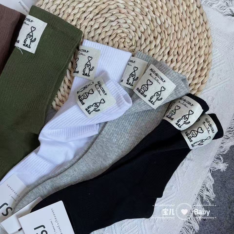 潮袜女春秋ins前贴标个性桃心抽象人物中筒袜可爱网红同款Aim长袜