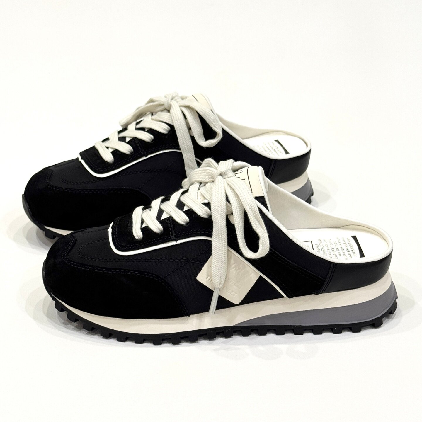 优慕妮真皮休闲运动小白鞋板鞋德训一脚蹬软底厚底包头半拖鞋女款