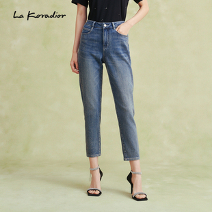 Koradior拉珂蒂春时尚 通勤 百搭线条淡蓝紧身牛仔裤 商场同款