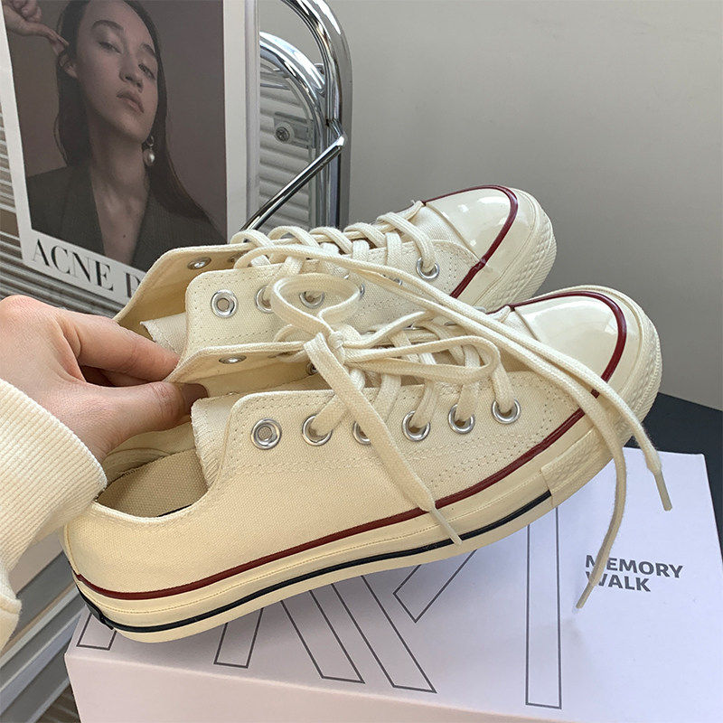韩版1970s低帮帆布鞋女米色圆头交叉绑带百搭小白鞋板鞋2026新款