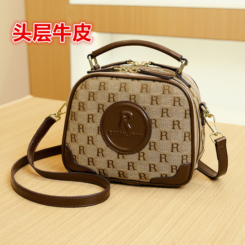 头层牛皮单肩斜挎包女软真皮手提包时尚小圆包手机包欧美2026新款