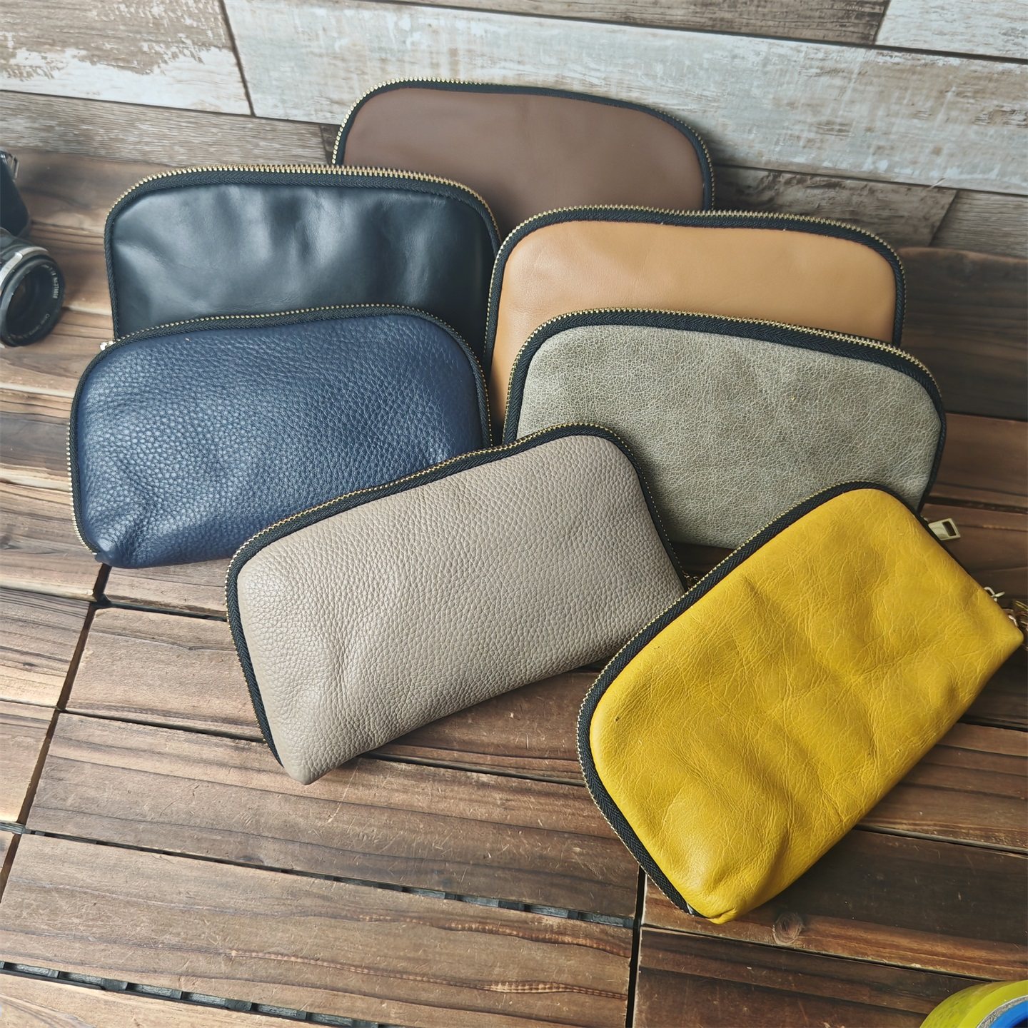 外贸库存清仓尾货女士真皮女包手拿手腕包化妆品收纳包零钱手机包