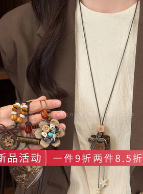 可爱萌宠~椰壳猫咪蝴蝶结流苏项链女独特设计长款挂脖毛衣链配饰