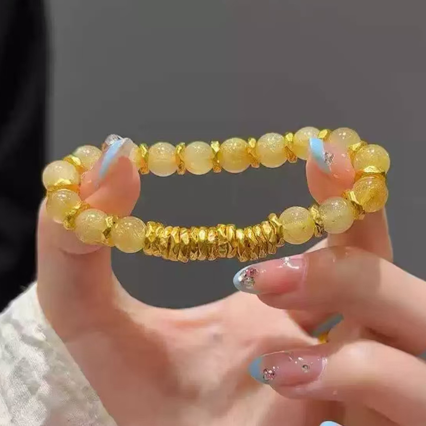 仿真黄金盘缠手串女黄水晶手链图片