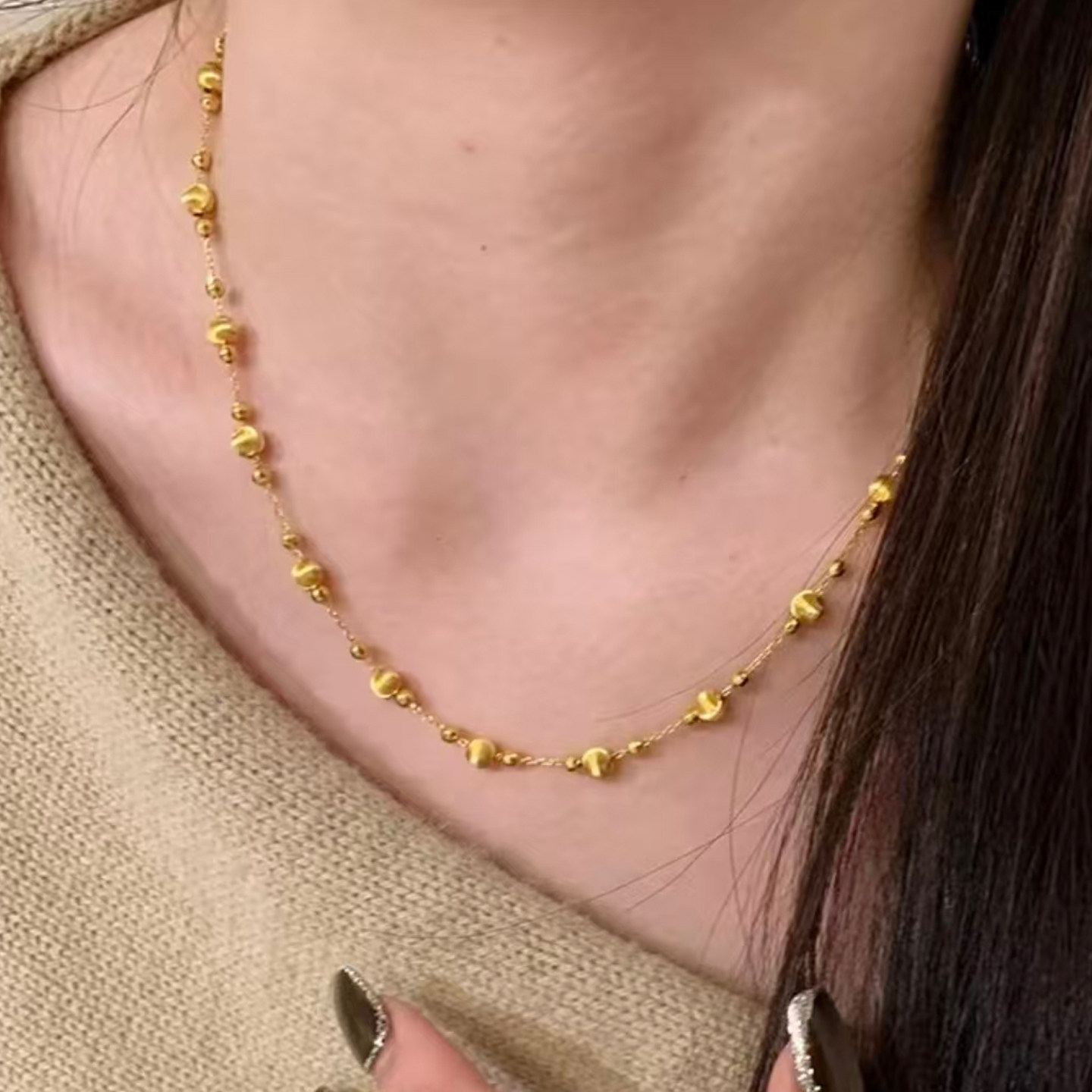 黄金色拉丝猫眼蹦迪珠项链女图片