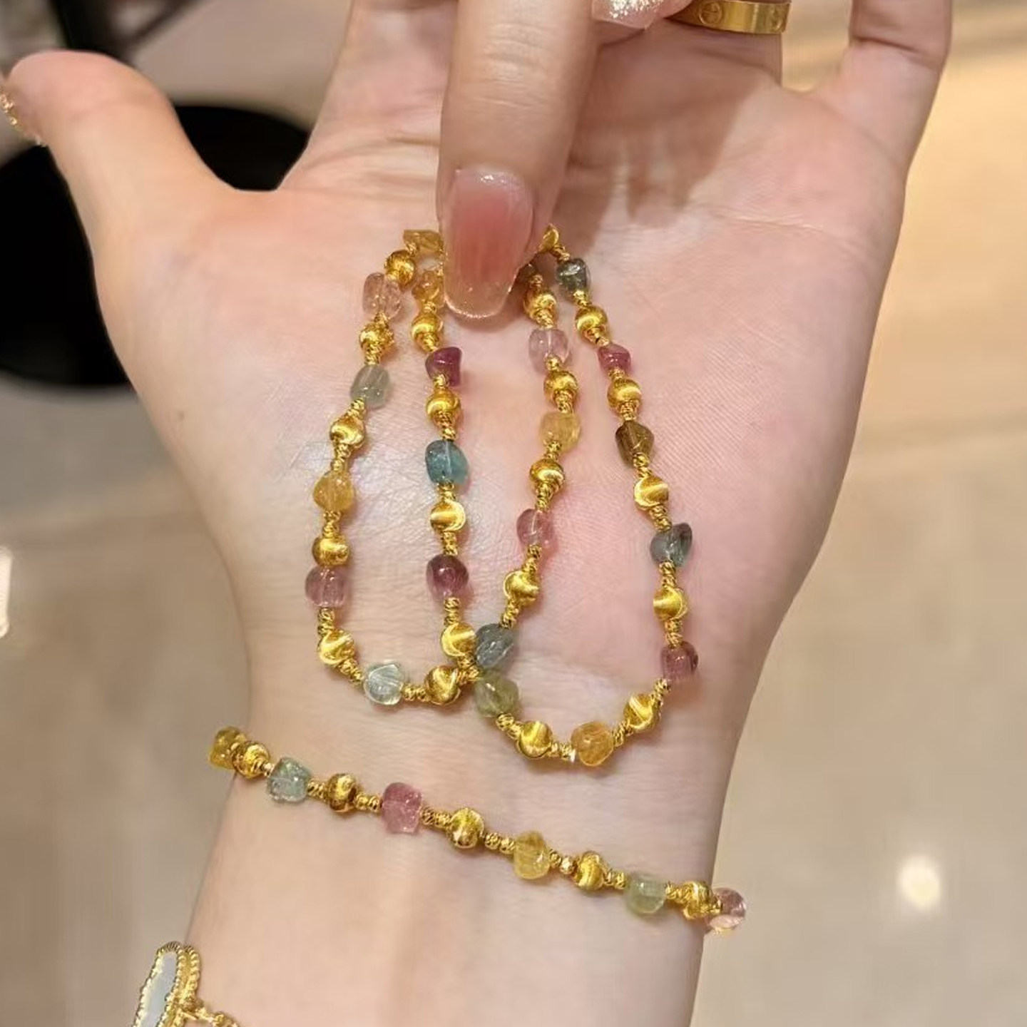 仿真黄金转运珠弹力彩虹碧玺手串图片