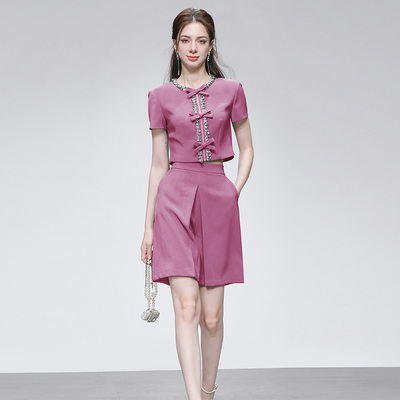 2025年夏季新款圆领蝴蝶结装饰宽松版上衣+高腰短款A字裙裤套装