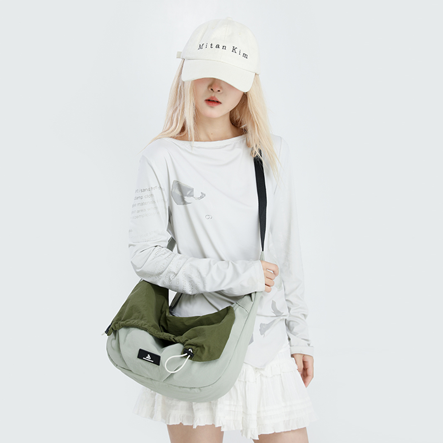 日系简约休闲轻便饺子包单肩包