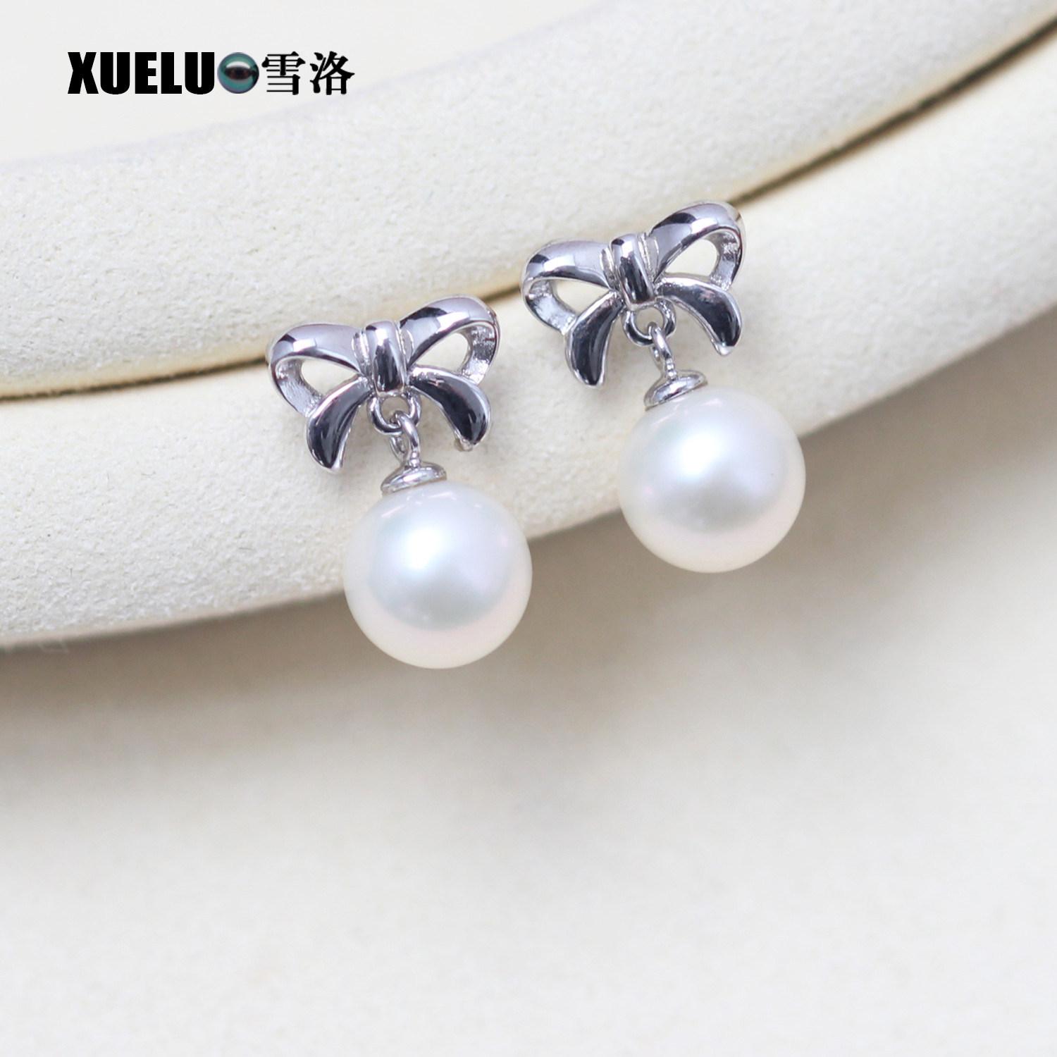 S925银蝴蝶结淡水珍珠短款耳钉