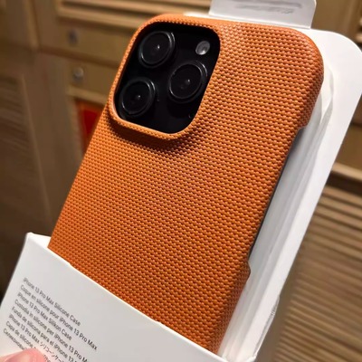 小众高级感橙色编织纹素皮拼接适用17苹果16promax手机壳新款iphone15promax磨砂14pro半包16plus创意13防摔2