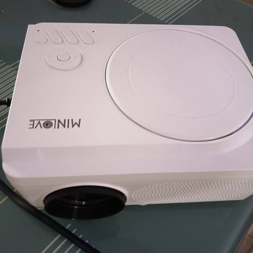 新影视双系统高清DVD光盘WiFi蓝牙U盘tf内存卡手机投屏三合一体投影仪多功能便携投影机有内置小音箱有话筒口