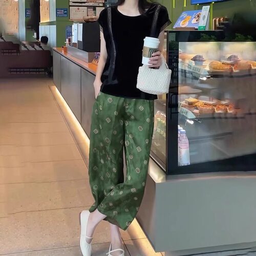 绿色印花休闲裤女2026夏季流行新款宽松时尚气质减龄百搭九分裤子
