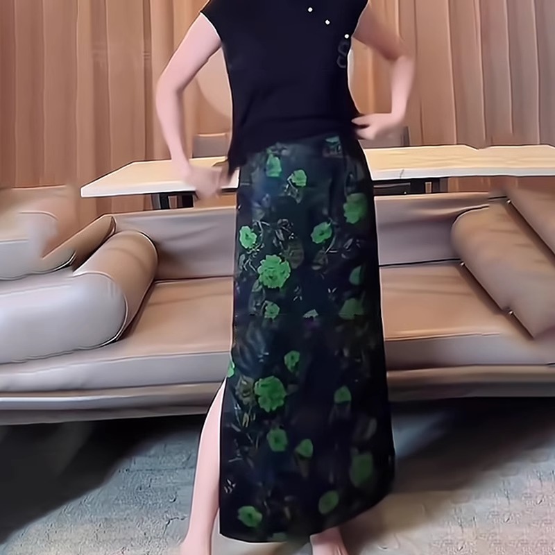 绿色印花半身裙女2025流行新款高腰简约宽松时尚气质侧开叉a字裙