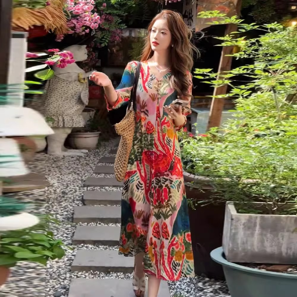 高级感减龄印花连衣裙女2025夏季新款时尚宽松中长款遮肚过膝裙子