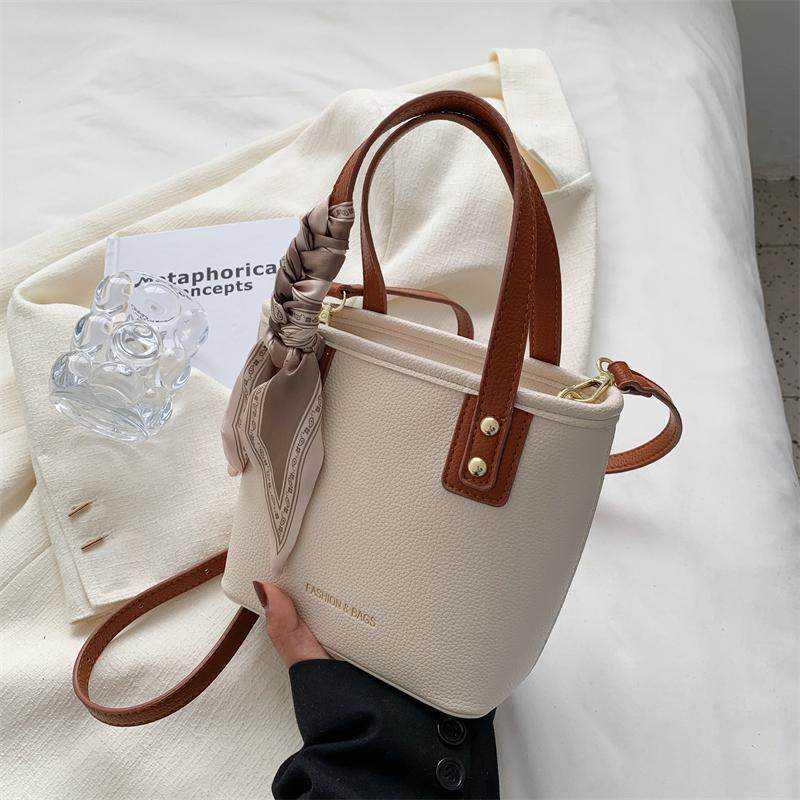 时尚简约大容量包包2025新款女秋冬季流行高级质感单肩斜挎水桶包,箱包皮具/热销女包/男包,水桶包,淘宝优惠券,粉丝福利购,淘宝优惠卷