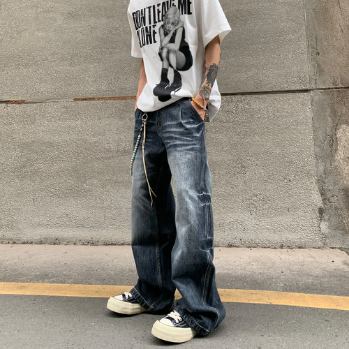 HY711捏褶弯刀猫须牛仔裤