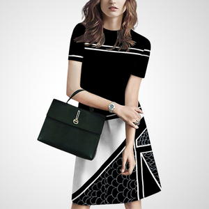 2026夏季法式复古v领波点连衣裙女设计感小众气质收腰过膝中长裙