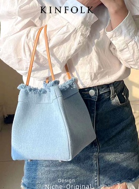 可变形小众洋气高质感文艺牛仔布拼接锦囊包迷你流苏水桶包菜篮子