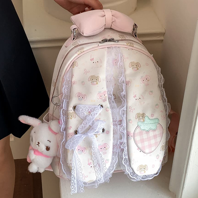 萌系少女涂鸦双肩背包图片